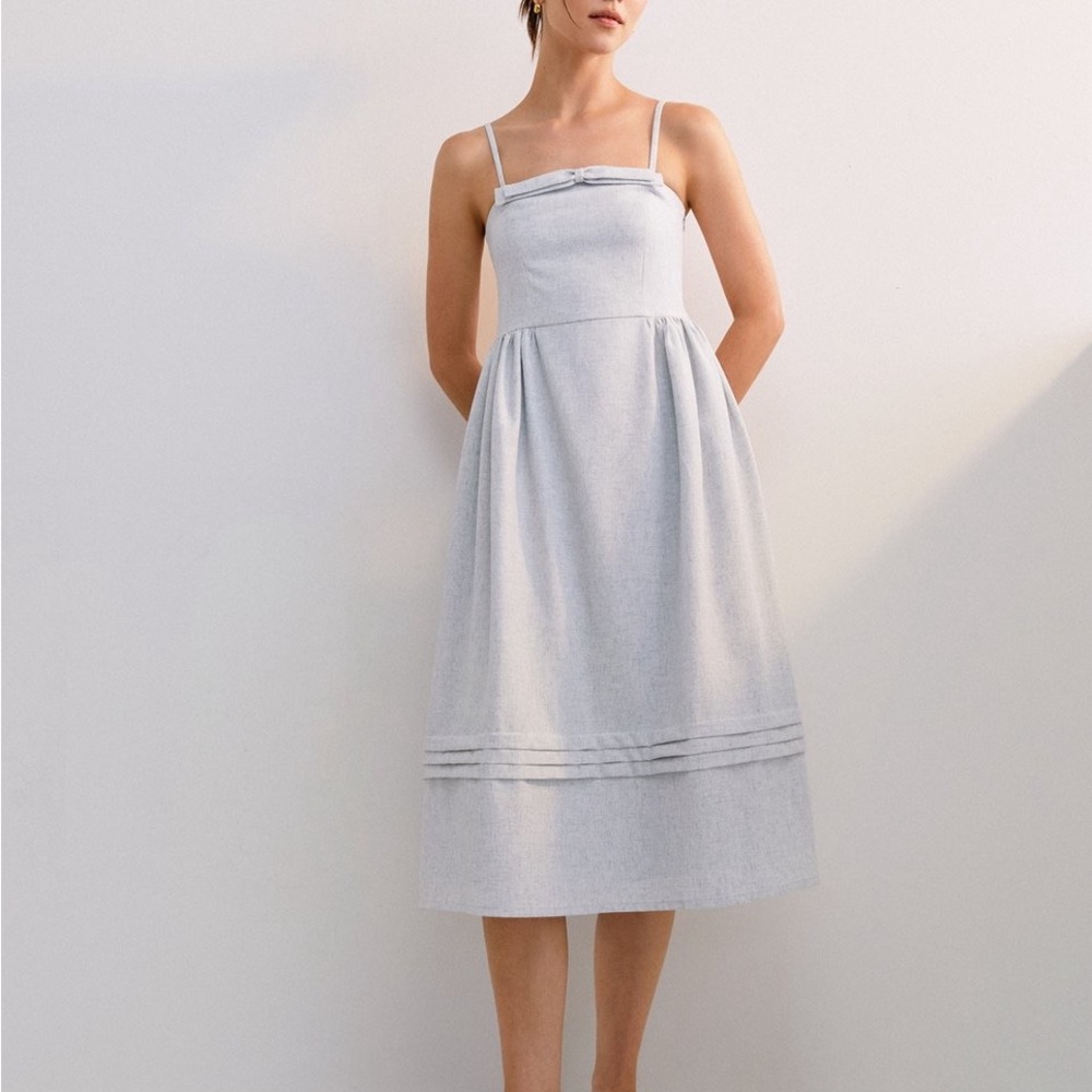 Light blue Pomelo midi dress with ruffle trim and removable straps